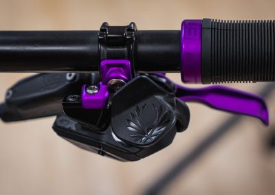 Purple SRAM brake levers and shifter clamp